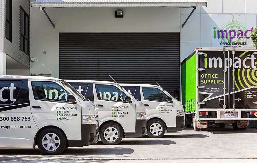 Some of the Impact Office Supplies company-owned delivery fleet at the Sunshine Coast Sales and Distribution Centre
