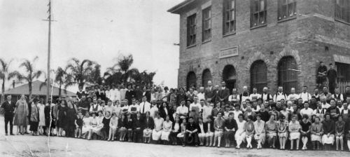 Staff pictured outside Dixon’s Shoe Factory, West End, Brisbane