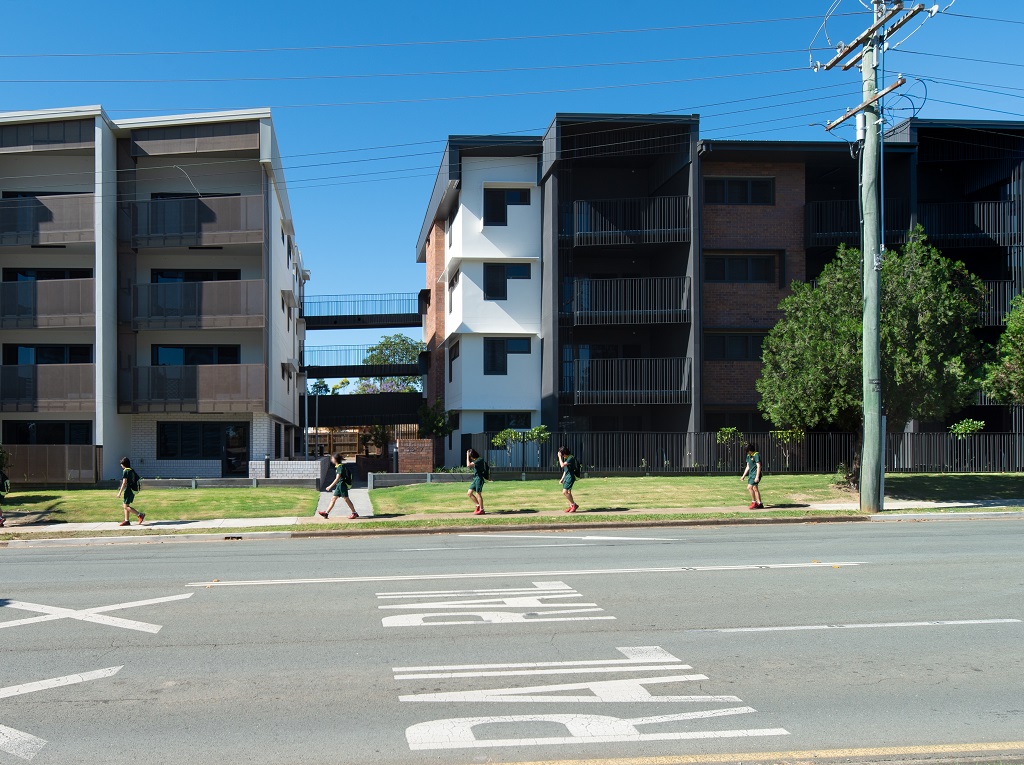  External view, showing the 2 distinct buildings linked by walkways. 